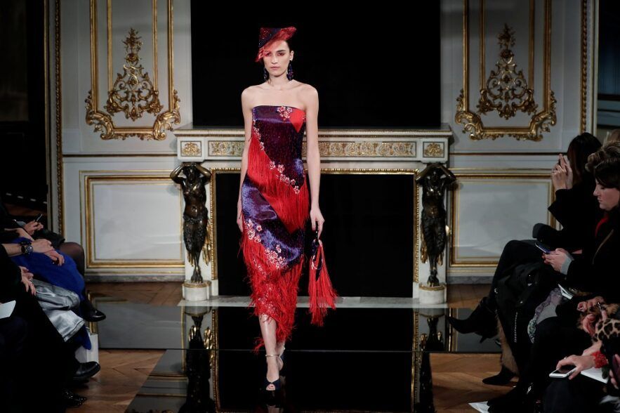 A model presents a creation by Italian designer Giorgio Armani as part of his Haute Couture Spring-Summer 2019 collection show for fashion house Giorgio Armani Prive in Paris